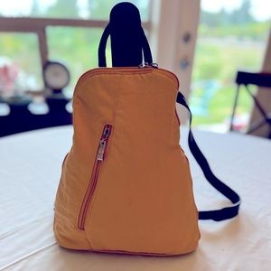 Little yellow Baggallini Bagpack; nylon; zipper front & back; great condition
